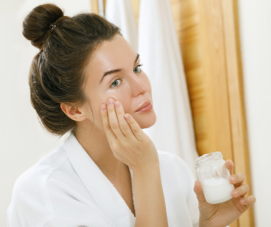 Applying coconut oil as dry skin home remedy