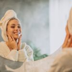 Flat lay of sensitive skin-friendly skincare products including aloe vera, green tea extract, and fragrance-free moisturizer