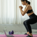 Woman doing air squats during a home workout routine