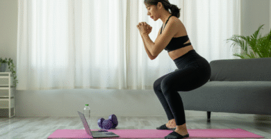 Woman doing air squats during a home workout routine